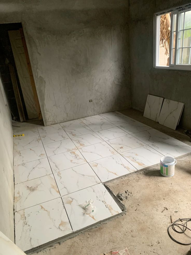 Vitrified Floor Tile Laying with Level and Spacers